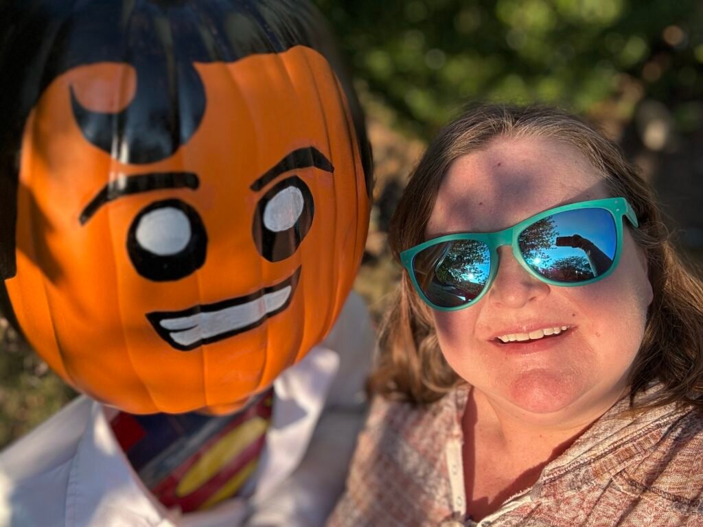 Rachel with one of the scarecrows on the scarecrow trail contest